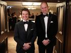 Britain's Prince William, Prince of Wales poses for a photo with US actor Tom Cruise at the London Air Ambulance Charity Gala Dinner.