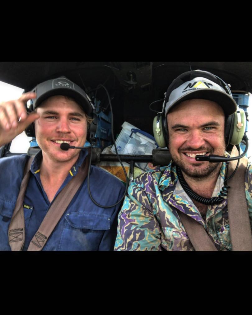 Pilot Sebastian Robinson, who is now a paraplegic, with Chris Wilson.