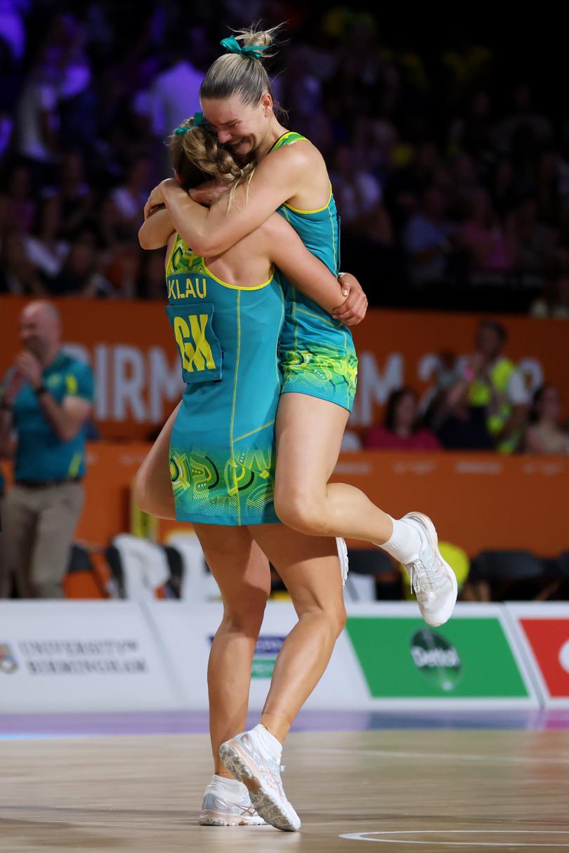 BIRMINGHAM, ENGLAND - AUGUST 07: Sarah Klau and Courtney Bruce of Team Australia celebrate victory during the Netball Gold Medal match between Team Jamaica and Team Australia on day ten of the Birmingham 2022 Commonwealth Games at NEC Arena on August 07, 2022 on the Birmingham, England. (Photo by Stephen Pond/Getty Images)