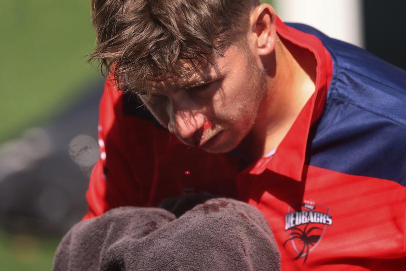 MELBOURNE, AUSTRALIA - FEBRUARY 08: Henry Hunt of South Australia leaves the field with blood streaming from his nose after being struck in the face by the ball whilst attempting to take a catch during the Marsh One Day Cup match between Victoria and South Australia at CitiPower Centre, on February 08, 2024, in Melbourne, Australia. (Photo by Daniel Pockett/Getty Images)