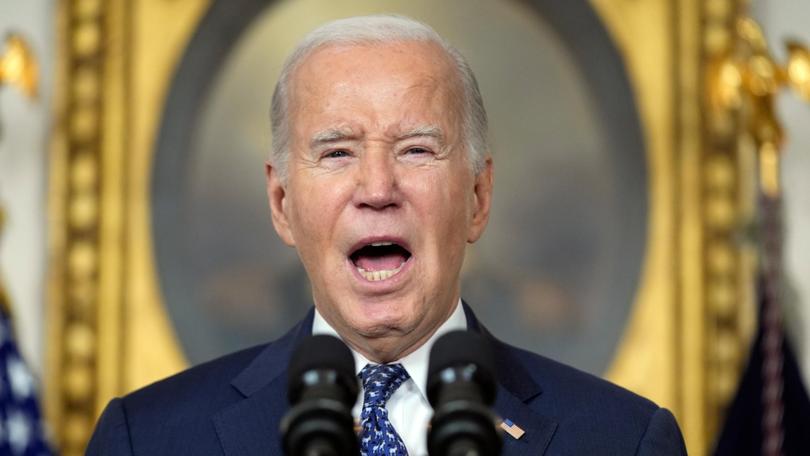 President Joe Biden speaks in the Diplomatic Reception Room of the White House.