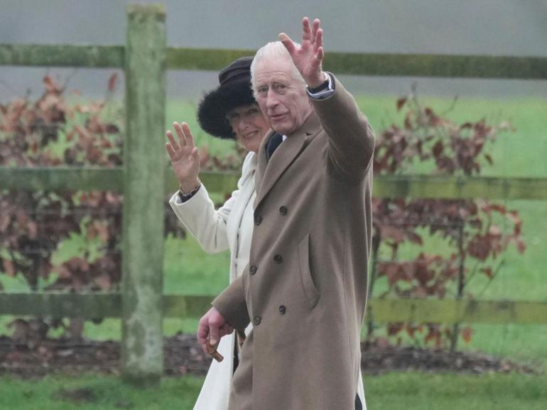 Britain's King Charles III and Queen Camilla wave to well wishers after attending a Sunday church service at St Mary Magdalene Church, in Sandringham, Norfolk, England, Sunday, Feb. 11, 2024. 
