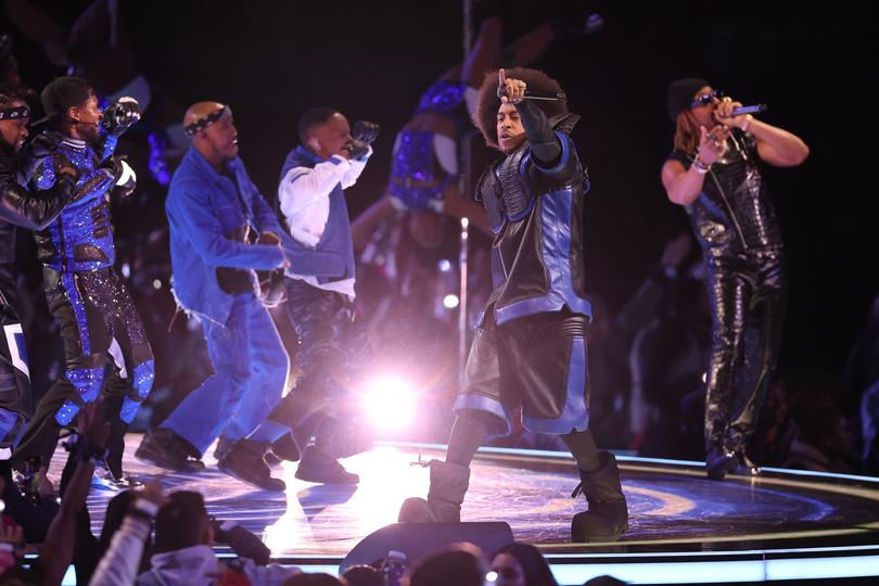 LAS VEGAS, NEVADA - FEBRUARY 11: (L-R) Usher, Ludacris and Lil Jon perform onstage during the Apple Music Super Bowl LVIII Halftime Show at Allegiant Stadium on February 11, 2024 in Las Vegas, Nevada. (Photo by Steph Chambers/Getty Images)