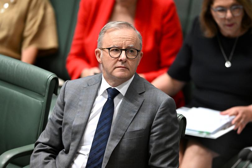 Australian Prime Minister Anthony Albanese reacts during Question Time at Parliament House in Canberra, Monday, February 12, 2024. (AAP Image/Lukas Coch) NO ARCHIVING