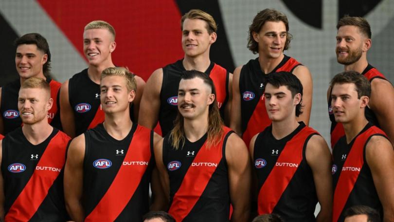 Essendon's Sam Draper (centre)