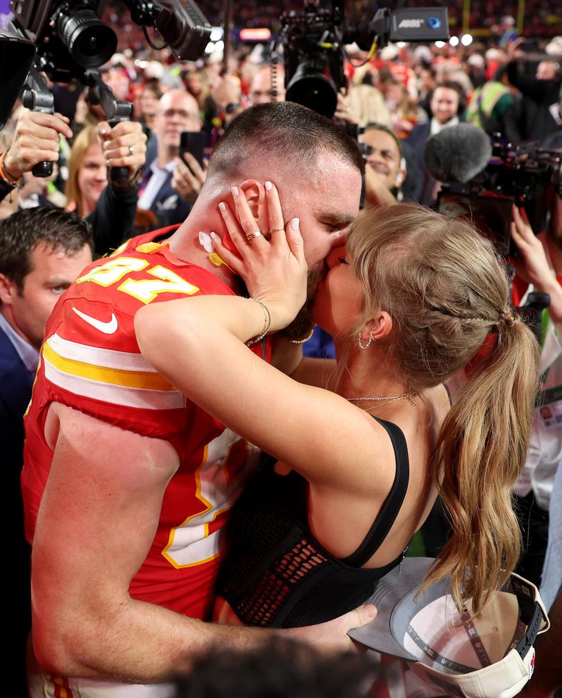 LAS VEGAS, NEVADA - FEBRUARY 11: Travis Kelce #87 of the Kansas City Chiefs kisses Taylor Swift after defeating the San Francisco 49ers 2 during Super Bowl LVIII at Allegiant Stadium on February 11, 2024 in Las Vegas, Nevada. (Photo by Ezra Shaw/Getty Images)