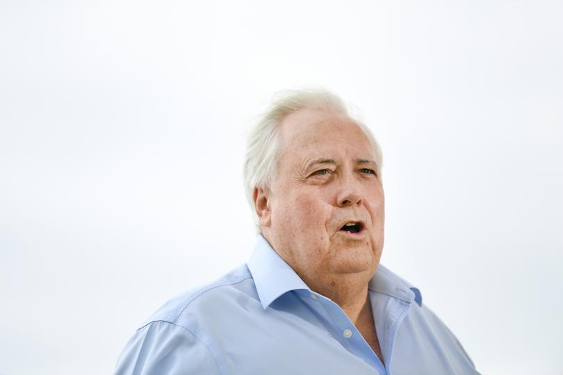 Businessman Clive Palmer is seen during a press conference on the Gold Coast, Monday, March 23, 2020. Mr Palmer said he will pay for more than one million doses of a malaria drug that could help fight coronavirus. (AAP Image/Dan Peled) NO ARCHIVING