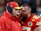 Travis Kelce #87 of the Kansas City Chiefs reacts at Head coach Andy Reid.