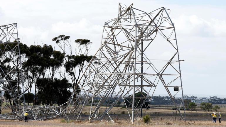 Hundreds of power poles and lines were downed and six transmission towers nearby collapsed on Tuesday.