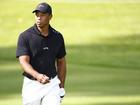 PACIFIC PALISADES, CALIFORNIA - FEBRUARY 13: Tiger Woods of the United States looks on as he practices prior to The Genesis Invitational at Riviera Country Club on February 13, 2024 in Pacific Palisades, California. (Photo by Ronald Martinez/Getty Images)