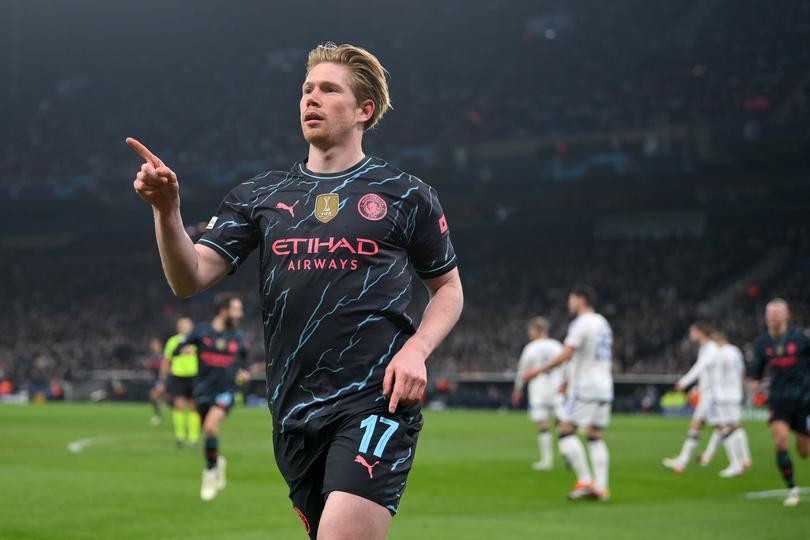 COPENHAGEN, DENMARK - FEBRUARY 13: Kevin De Bruyne of Manchester City celebrates scoring his team's first goal during the UEFA Champions League 2023/24 round of 16 first leg match between F.C. Copenhagen and Manchester City at Parken Stadium on February 13, 2024 in Copenhagen, Denmark. (Photo by Justin Setterfield/Getty Images)