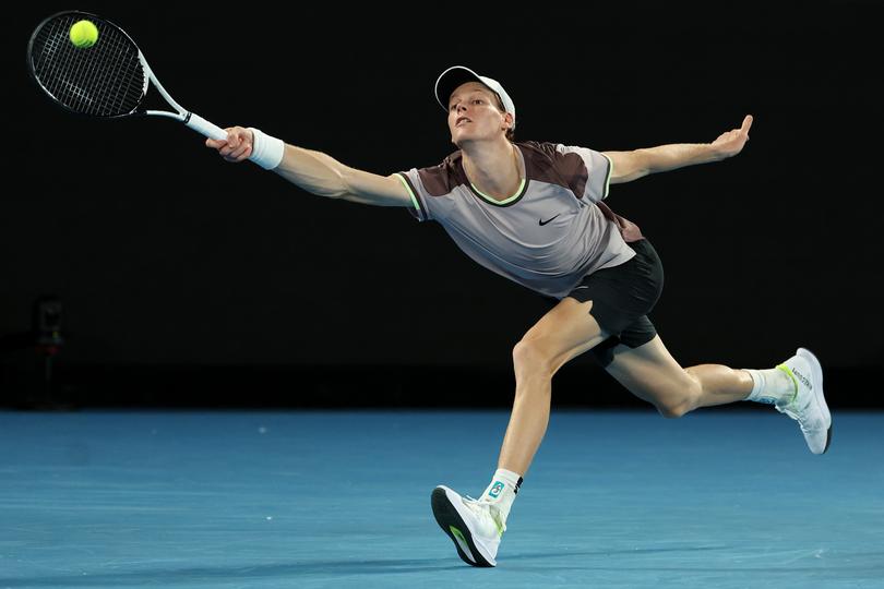 MELBOURNE, AUSTRALIA - JANUARY 28: Jannik Sinner of Italy plays a forehand during their Men's Singles Final match against Daniil Medvedev during the 2024 Australian Open at Melbourne Park on January 28, 2024 in Melbourne, Australia. (Photo by Cameron Spencer/Getty Images) *** BESTPIX ***