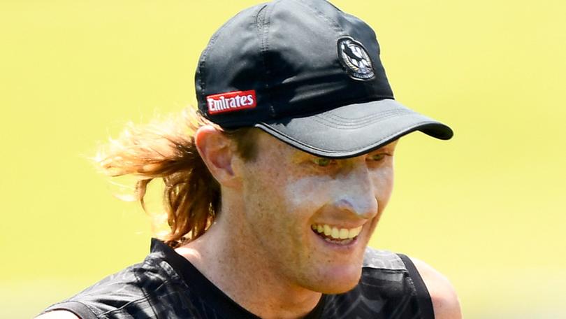 MELBOURNE, AUSTRALIA - FEBRUARY 07: Nathan Murphy of the Magpies does run throughs during a Collingwood Magpies AFL training session at AIA Centre on February 07, 2024 in Melbourne, Australia. (Photo by Josh Chadwick/Getty Images)