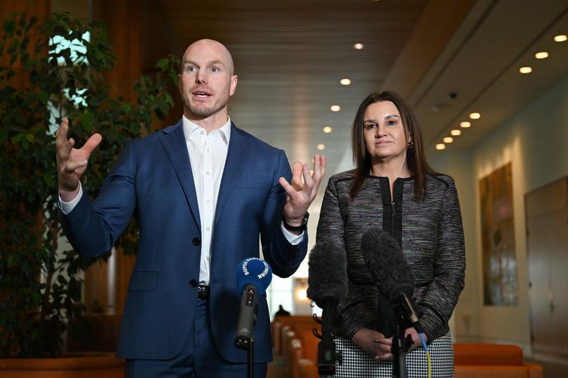 Crossbench Senators David Pocock and Jacqui Lambie speak to the media during a press conference at Parliament House in Canberra, Thursday, November 9, 2023. (AAP Image/Lukas Coch) NO ARCHIVING