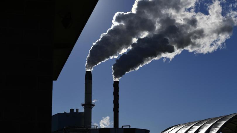 Almost half of bosses say they are likely to reduce decarbonisation investment if conditions worsen. (Dave Hunt/AAP PHOTOS)