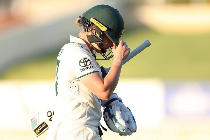 PERTH, AUSTRALIA - FEBRUARY 15: Alyssa Healy of Australia walks from the field after being dismissed for 99 by Delmi Tucker of South Africa during day one of the Women's Test Match between Australia and South Africa at the WACA on February 15, 2024 in Perth, Australia. (Photo by Paul Kane/Getty Images)