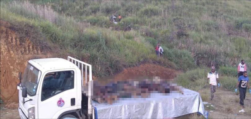 Graphic videos and photos have emerged of the bodies of the men loaded onto a police truck.