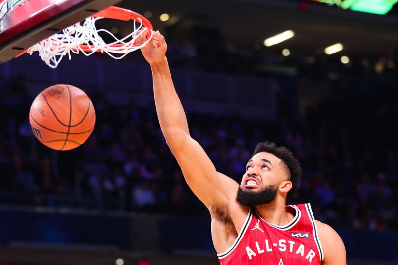 INDIANAPOLIS, INDIANA - FEBRUARY 18: Karl-Anthony Towns #32 of the Minnesota Timberwolves and Western Conference All-Stars dunks the ball against the Eastern Conference All-Stars in the third quarter during the 2024 NBA All-Star Game at Gainbridge Fieldhouse on February 18, 2024 in Indianapolis, Indiana. NOTE TO USER: User expressly acknowledges and agrees that, by downloading and or using this photograph, User is consenting to the terms and conditions of the Getty Images License Agreement. (Photo by Stacy Revere/Getty Images) *** BESTPIX ***