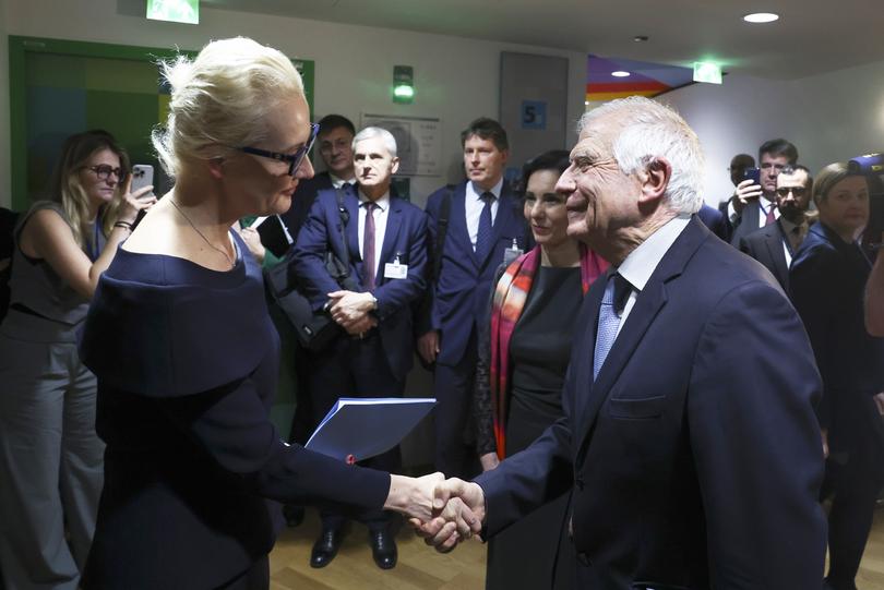 Yulia Navalnaya, wife of Russian opposition leader Alexei Navalny, left, shakes hands with European Union foreign policy chief Josep Borrell prior to addressing a meeting of EU foreign ministers at the European Council building in Brussels, Monday, Feb. 19, 2024. European Union foreign ministers on Monday will discuss, among other issues, the situation in the Middle East and Russian aggression against Ukraine. (Yves Herman, Pool Photo via AP)