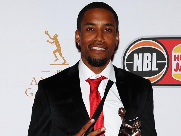 Bryce Cotton celebrates his fourth MVP win.(Photo by Graham Denholm/Getty Images for NBL)