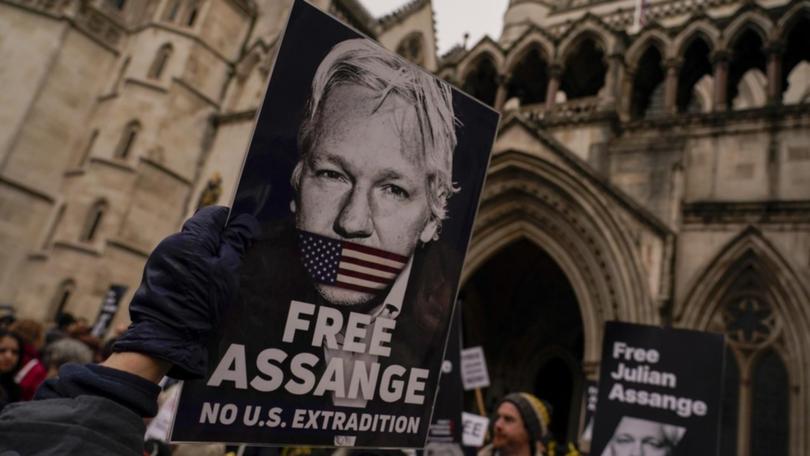 Julian Assange's lawyer said the WikiLeaks founder didn't attend the hearing because he was unwell. 