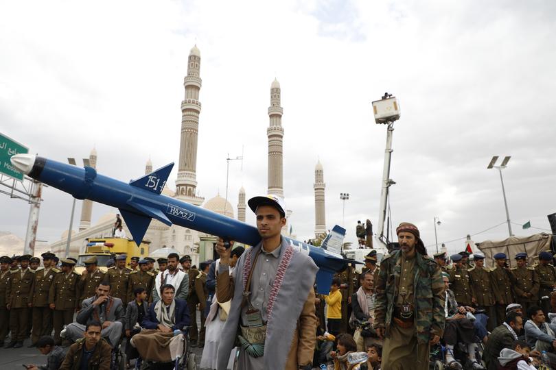 Houthi supporters attend a rally against the U.S.-led strikes against Yemen and in the support of Palestinians in the Gaza Strip, in Sanaa, Yemen, Friday, Feb. 16, 2024. (AP Photo/Osamah Abdulrahman)