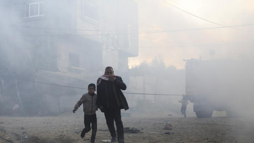 Prince William’ has decried the “terrible human cost” of the conflict in a rare move. Pictured: Palestinians run away after an Israeli strike on a residential building in Rafah.