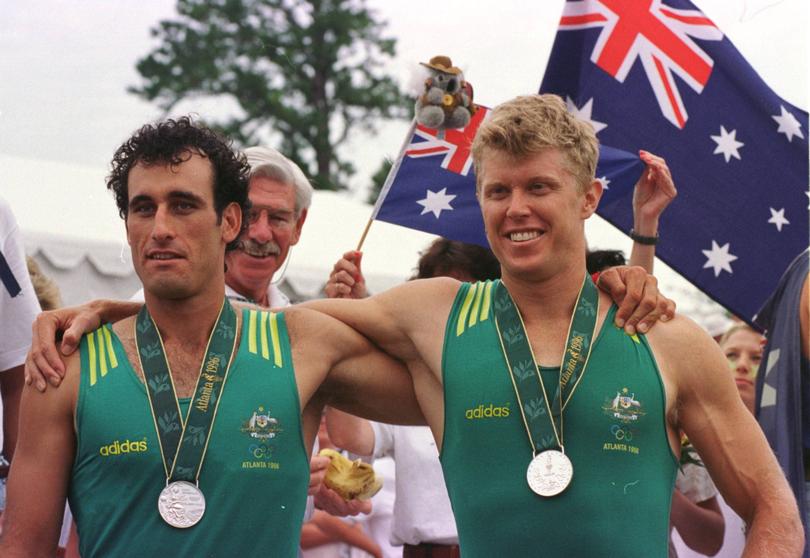 OLYS221 ATLANTA JULY 27 AAP (ROWING) - Australian's Rob Scott (left) and David Weightman winners of the silver medal in the men's coxless pairs at the Olympics today.  AAP PHOTO / ROD TAYLOR.  (AAP POOL).