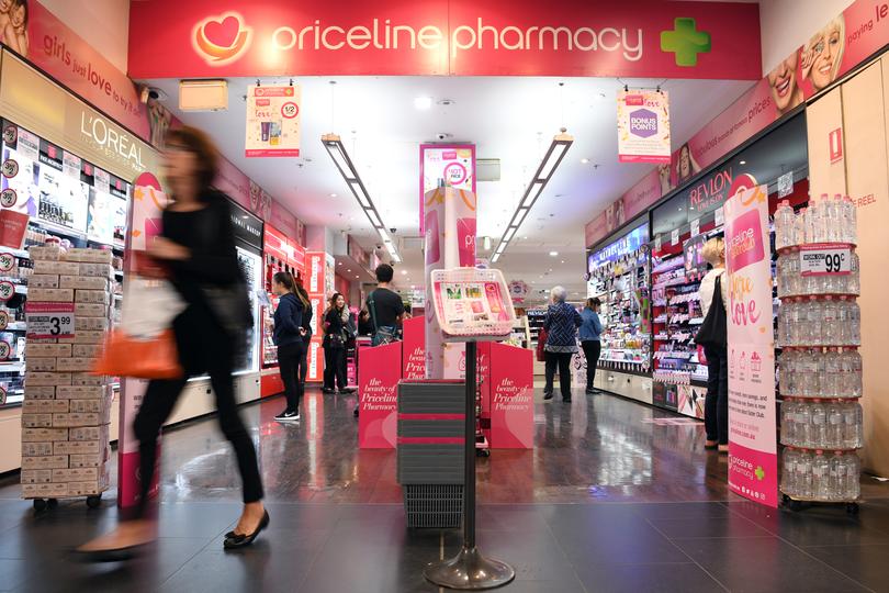 A shopper leaves a Priceline Pharmacy store in Sydney on Thursday, April 20, 2017. Australian Pharmaceutical Industries expects to boost its Priceline Pharmacy network by at least 20 stores during the current financial year and to lift its full-year net profit by at least 10 per cent. (AAP Image/Paul Miller) NO ARCHIVING