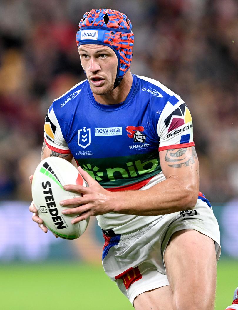 BRISBANE, AUSTRALIA - JUNE 10: Kalyn Ponga of the Knights breaks away from the defence during the round 15 NRL match between Brisbane Broncos and Newcastle Knights at Suncorp Stadium on June 10, 2023 in Brisbane, Australia. (Photo by Bradley Kanaris/Getty Images)