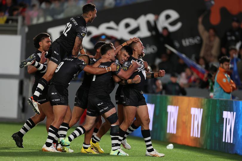 AUCKLAND, NEW ZEALAND - OCTOBER 21:  James Fisher-Harris, captain of the Kiwis (R) scores a try and celebrates during the Mens Pacific Championships match between New Zealand Kiwis and Toa Samoa at Eden Park on October 21, 2023 in Auckland, New Zealand. (Photo by Fiona Goodall/Getty Images)