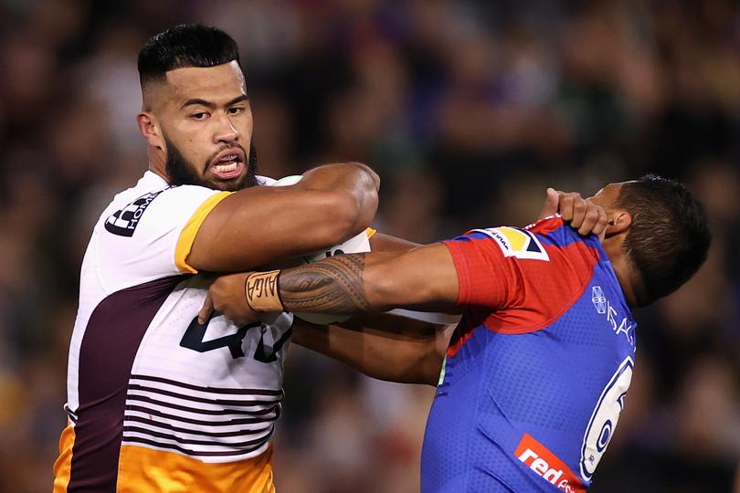 NEWCASTLE, AUSTRALIA - MAY 19: Payne Haas of the Broncos is tackled during the round 11 NRL match between the Newcastle Knights and the Brisbane Broncos at McDonald Jones Stadium, on May 19, 2022, in Newcastle, Australia. (Photo by Cameron Spencer/Getty Images)