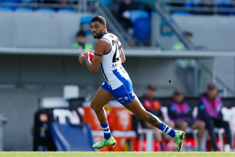 HOBART, AUSTRALIA - AUGUST 26: Tarryn Thomas of the Kangaroos in action during the 2023 AFL Round 24 match between the North Melbourne Kangaroos and the Gold Coast SUNS at Blundstone Arena on August 26, 2023 in Hobart, Australia. (Photo by Dylan Burns/AFL Photos)