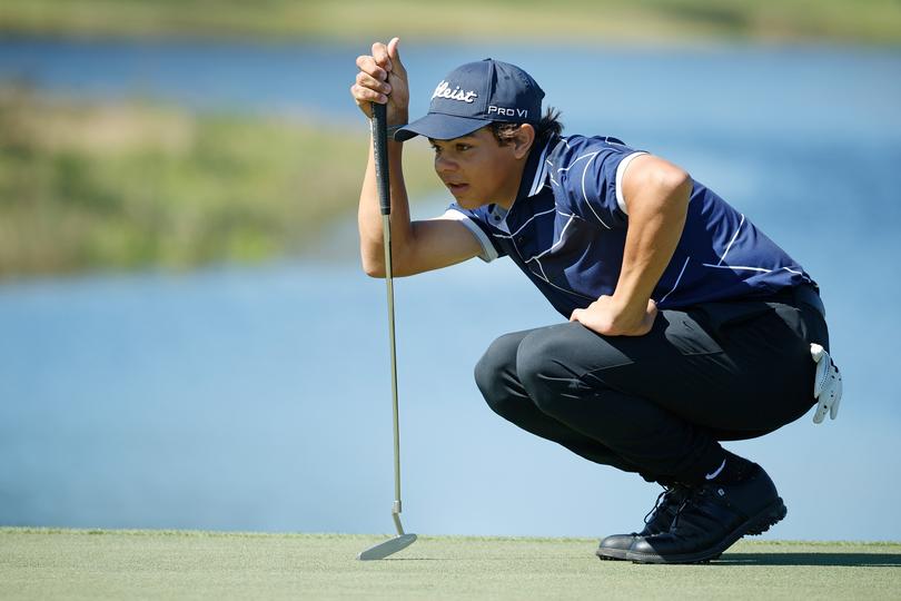 HOBE SOUND, FLORIDA - FEBRUARY 22: Charlie Woods lines up a putt on the 15th green during pre-qualifying for The Cognizant Classic in The Palm Beaches at Lost Lake Golf Club on February 22, 2024 in Hobe Sound, Florida. (Photo by Cliff Hawkins/Getty Images)