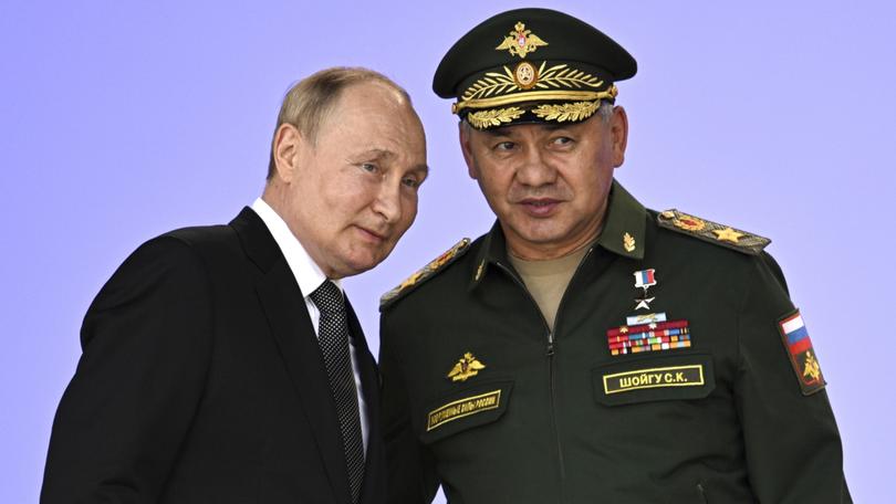 Russia's President Vladimir Putin and Russian Defense Minister Sergei Shoigu.