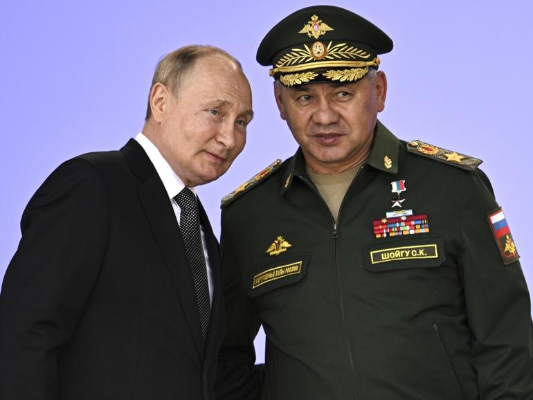 Russia's President Vladimir Putin and Russian Defense Minister Sergei Shoigu.