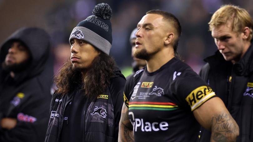 Jarome Luai and James Fisher-Harris look on dejected after the loss.