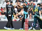 Adam Milne celebrates with Trent Boult after taking the wicket of Steve Smith on Sunday.