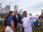  Former Australian Prime Minister Scott Morrison (L) takes a selfie with a supporters during a rally against antisemitism.