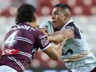 Sione Hopoate - a familiar surname to Sea Eagles fans -  is tackled by Manly’s Clayton Faulalo on Saturday.