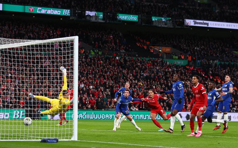 Virgil van Dijk’s match-winning goal as he beats Chelsea goalkeeper Djordje Petrovic in the Carabao Cup Final.