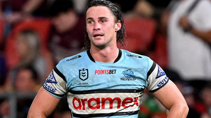 BRISBANE, AUSTRALIA - MAY 06: Nicho Hynes of the Sharks looks dejected after his team loses the round 10 NRL match between Cronulla Sharks and Dolphins at Suncorp Stadium on May 06, 2023 in Brisbane, Australia. (Photo by Bradley Kanaris/Getty Images)