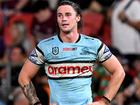 BRISBANE, AUSTRALIA - MAY 06: Nicho Hynes of the Sharks looks dejected after his team loses the round 10 NRL match between Cronulla Sharks and Dolphins at Suncorp Stadium on May 06, 2023 in Brisbane, Australia. (Photo by Bradley Kanaris/Getty Images)