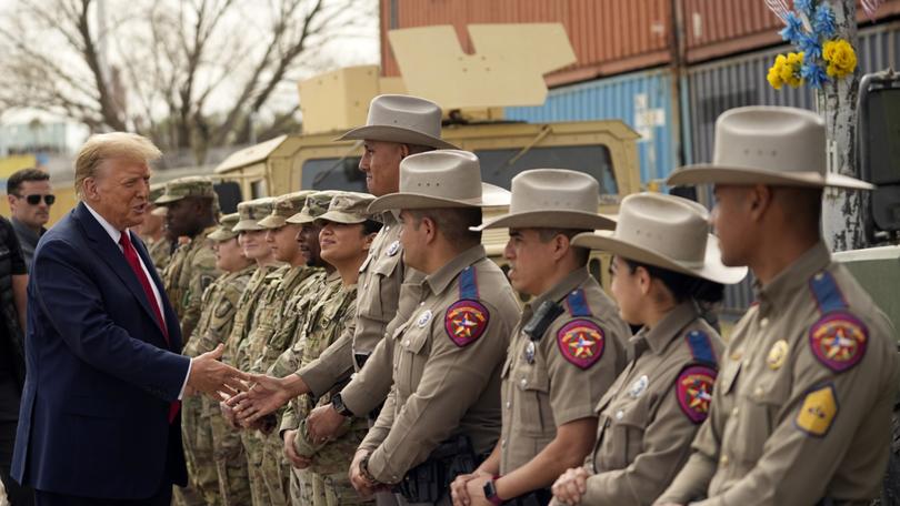 Republican presidential candidate former President Donald Trump greets members of Texas Department of Public Safety.