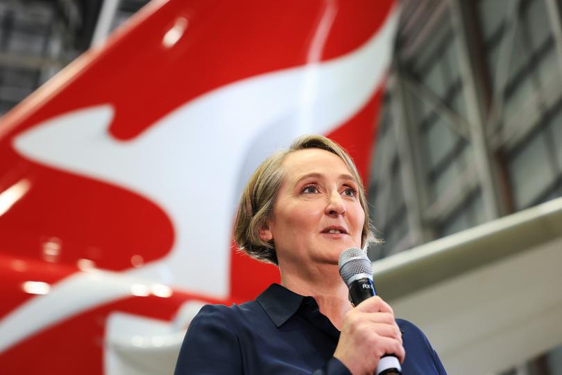 SYDNEY, AUSTRALIA - FEBRUARY 22: Qantas chief executive Vanessa Hudson speaks during a media opportunity at Hangar 96, Qantas Sydney Jet Base on February 22, 2024 in Sydney, Australia. Qantas has demonstrated a significant financial turnaround, reporting a record $2.47 billion profit for the 2022-23 fiscal year, marking a stark change from the previous year's $1.86 billion loss. The airline's strong performance was attributed to robust travel demand and high ticket prices, with domestic earnings before interest and taxes (EBIT) jumping to 18.2%, representing a 50% increase in profit margins over the past six years. The company's return on invested capital also increased to 103.6%, reflecting its improved financial position and operational performance. (Photo by Jenny Evans/Getty Images)