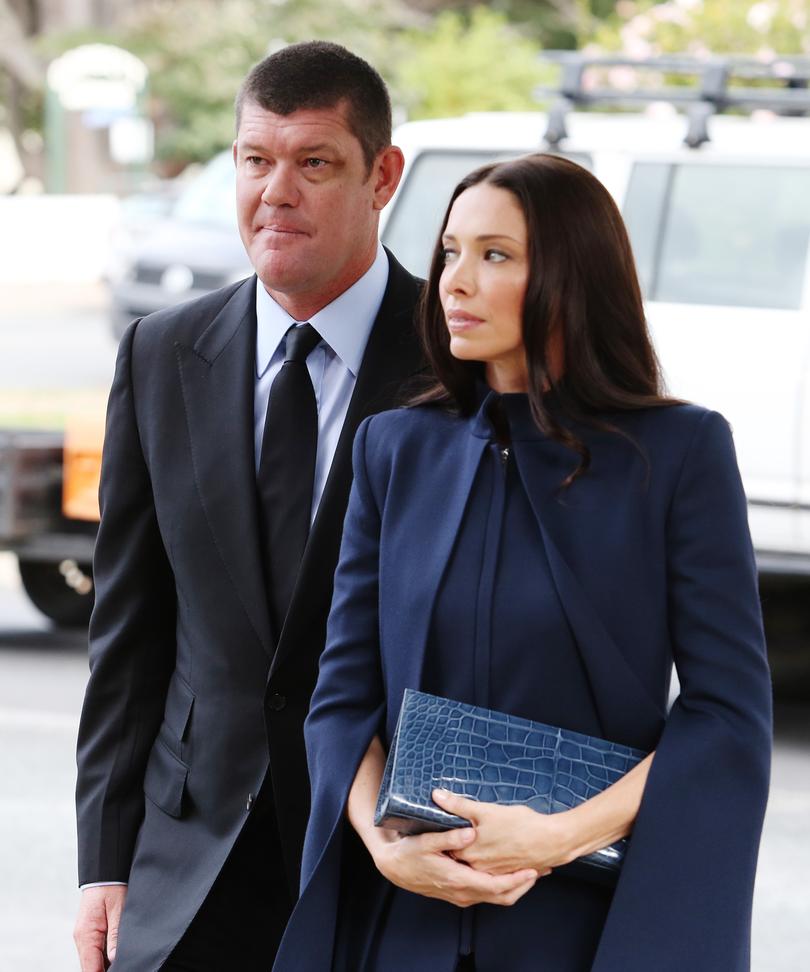 James and Erica Packer arrive at Paul Ramsey's funeral at St Thomas Aquinas Church in Bowral. Picture Craig Greenhill