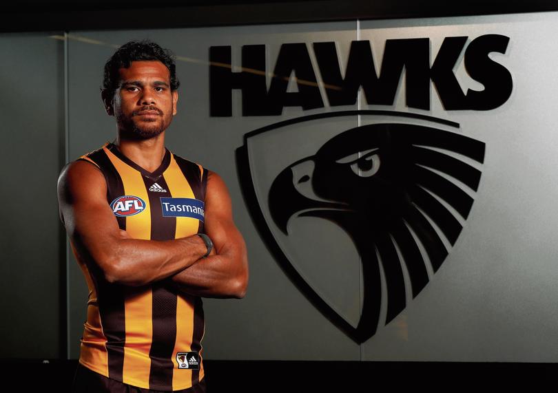 MELBOURNE, AUSTRALIA - JANUARY 24: Cyril Rioli of the Hawks poses for a portrait during the Hawthorn Hawks team photo day at the Ricoh Centre, Melbourne on January 24, 2017 in Melbourne, Australia. (Photo by Adam Trafford/AFL Media)