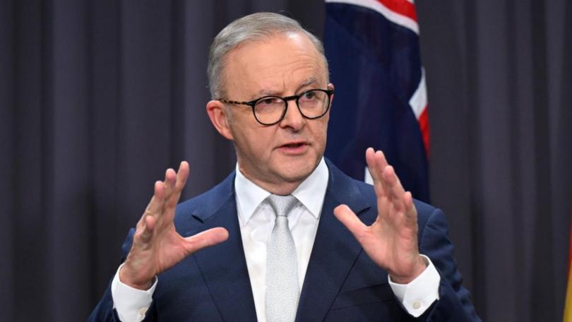 Prime Minister Anthony Albanese said the tax cuts were aimed at "middle Australia" . (Lukas Coch/AAP PHOTOS)