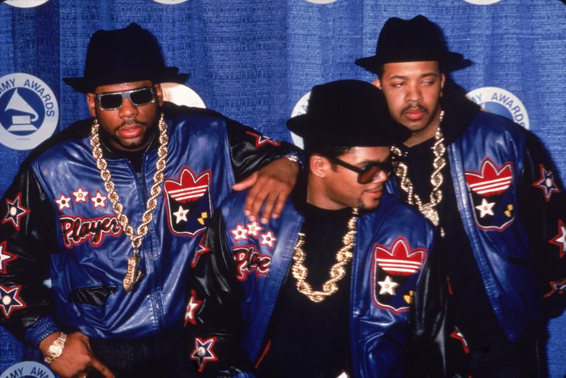 Portrait of American hip-hop and rap group Run-DMC backstage at the Grammy Awards, New York, New York, March 2, 1987. Left to right, Joe Simmons (Run) Jason Mizell (Jam Master Jay) (1965 - 2002), and Darryl McDaniels (DMC). (Photo by Hulton Archive/Getty Images)