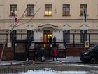 The Canada and Australia flags at the building that contains their embassies in Kyiv, Ukraine.